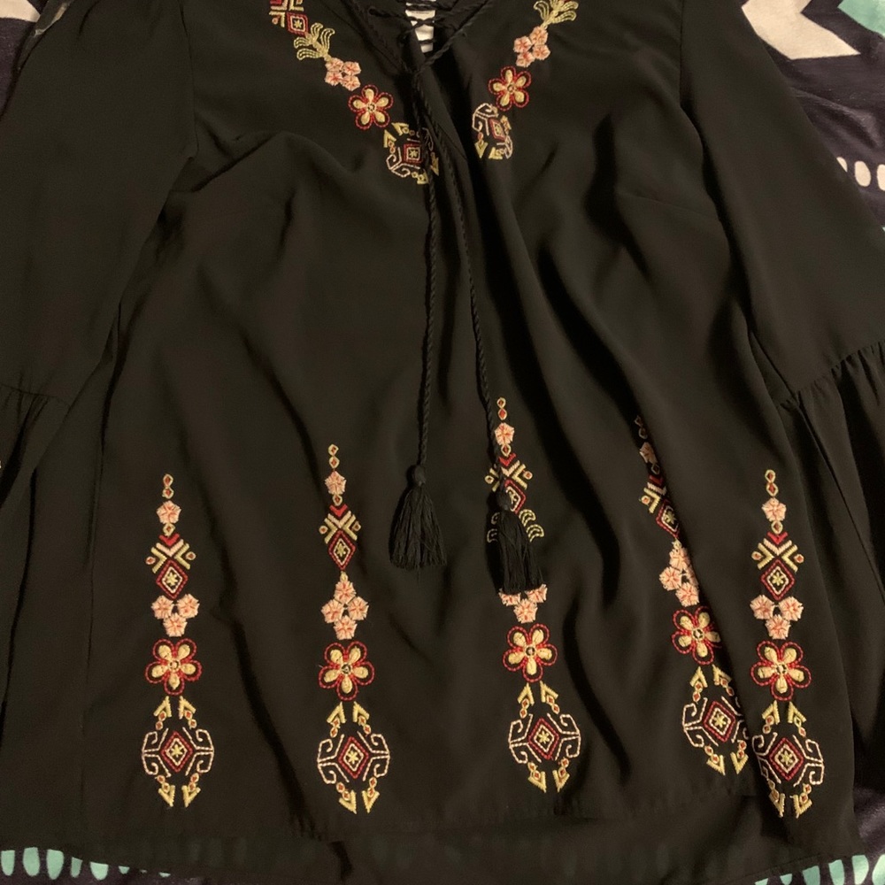 Sheer black blouse